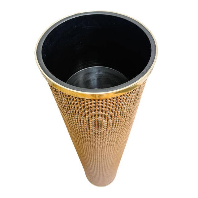 This striking, one-of-a-kind floor planter makes a bold vertical statement with its impressive height and rich, organic...