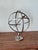 This vintage armillary sphere is a sculptural interpretation of a historic astronomical teaching tool. Composed of...