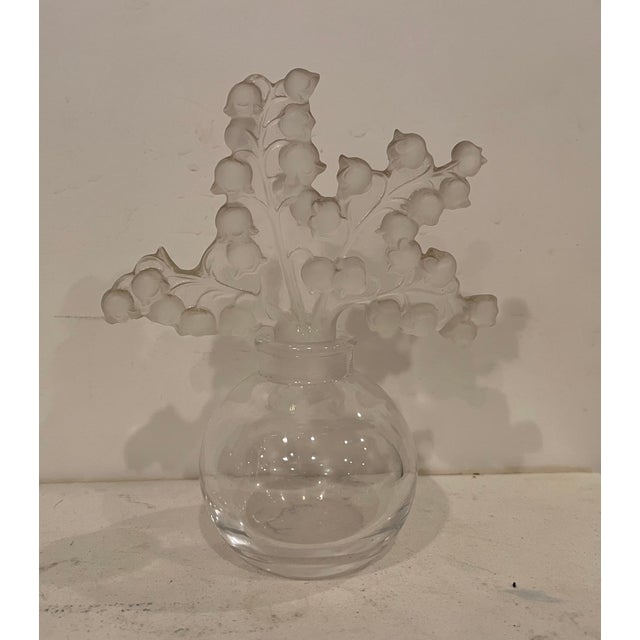 This beautiful classic LALIQUE CRYSTAL perfume bottle is signed on the bottom. Classic Rene Lalique design from 1931....