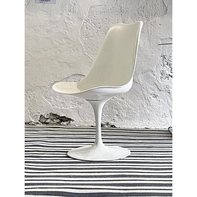 Two of the six available chairs are swivel models. All pieces are original; however, the chair tops were refinished at...