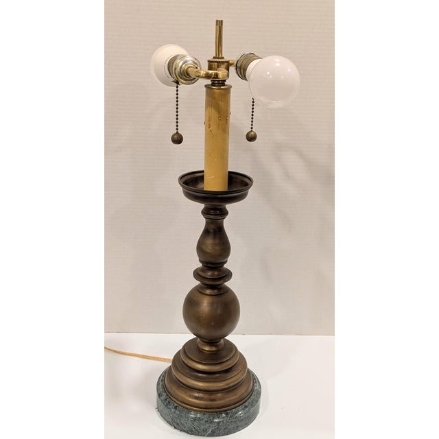 Featured is a solid brass lamp on a solid green marble base, this lamp heavy. The lamp would work as a table lamp, bedside...