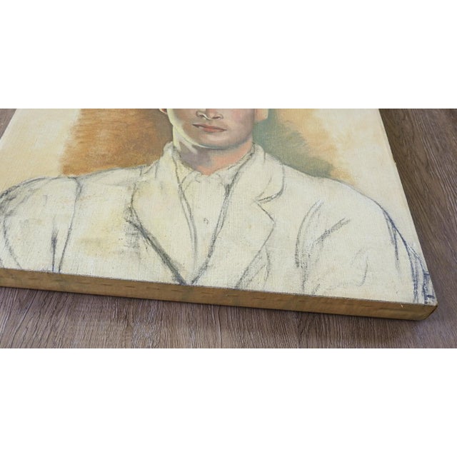 Mid 20th century oil on linen portrait painting of blue eyed serious young man. Unsigned, unfinished. Unframed, tape...