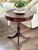 Elevate your interior with this exceptional mid-century traditional drum table by the renowned Lane Furniture Company....