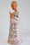 Studio Piece Stylized Clay and Glaze Figure of a standing girl with lowered head, holding a book and a cloth by Margit...