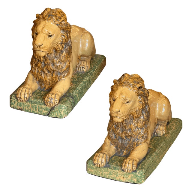 Pair of 19th Century French Faience Glazed Ceramic Recumbent Lions For Sale