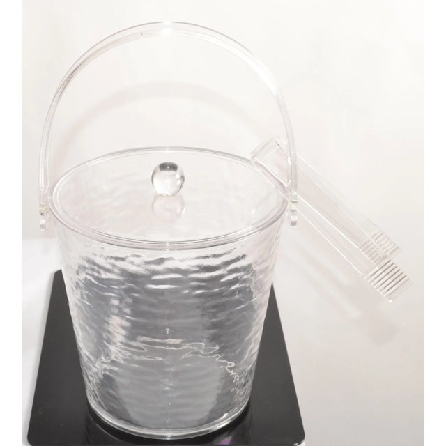 This Retro Grainware Ice Bucket with Lid and Tongs is perfect for any party or occasion. The clear acrylic material gives...