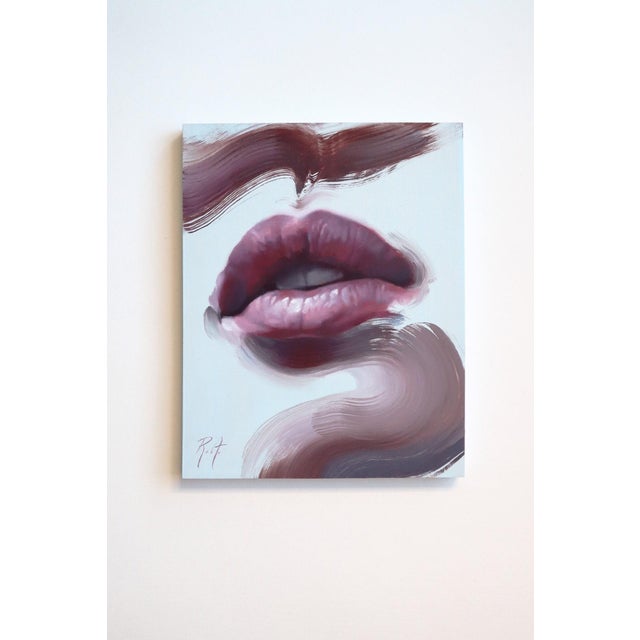 This artwork features an intimate close-up of a pair of lips, rendered in soft, fluid brushstrokes that convey a sense of...