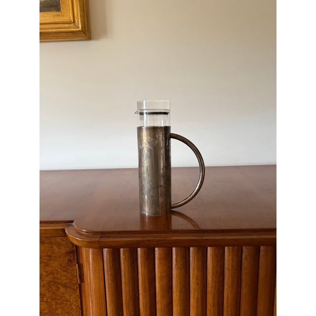 Modern silverplated and glass cruet mod. Oilvine Lino Sabattini Italy 1970s Silver-plated metal and glass, plastic H 21 -...