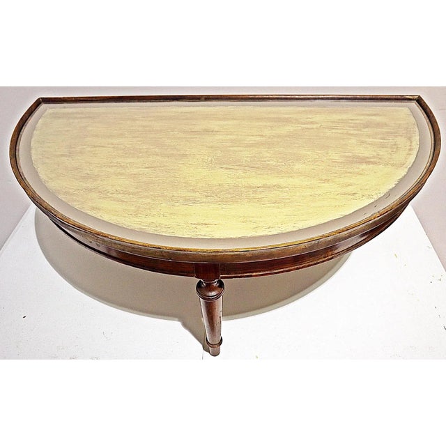 Unique demi-lune cocktail table in solid rosewood. This sweet piece has a 2 tone Chalk Paint® washed finish all under the...