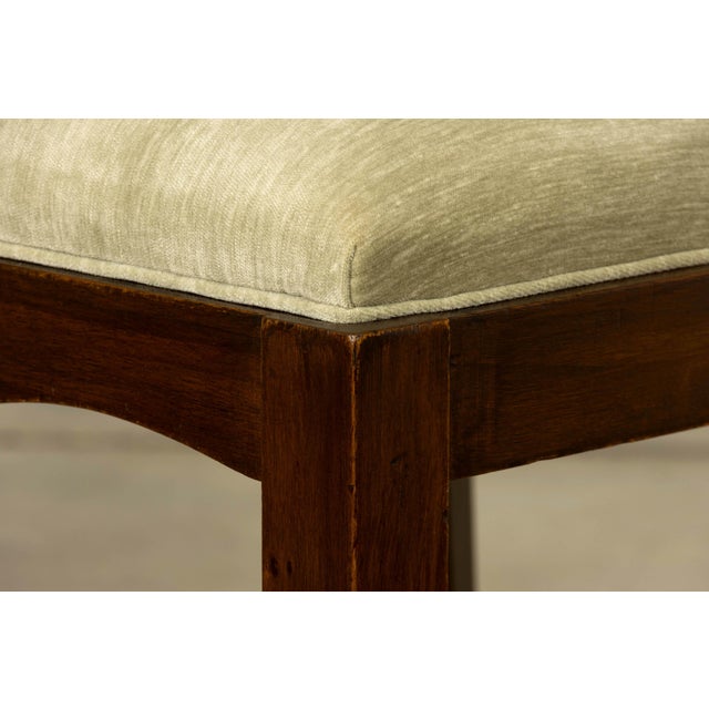 A refined set of eight French Art Deco dining chairs dating to the 1930s, crafted in walnut and sourced in Provence,...