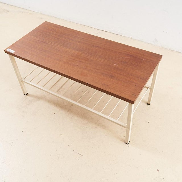 Teak and white enamelled iron coffee table from the 70s height: 39.5 width: 84 depth: 39 style: vintage production period:...