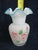 This beautiful Vase is made out of glass. This Vase has incredible vintage style with a classic ruffled rim silhouette, a...