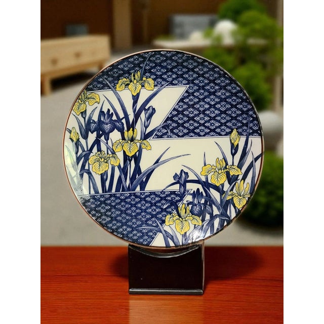 This vintage Japanese porcelain serving platter features intricate painted floral irises, showcasing traditional Japanese...