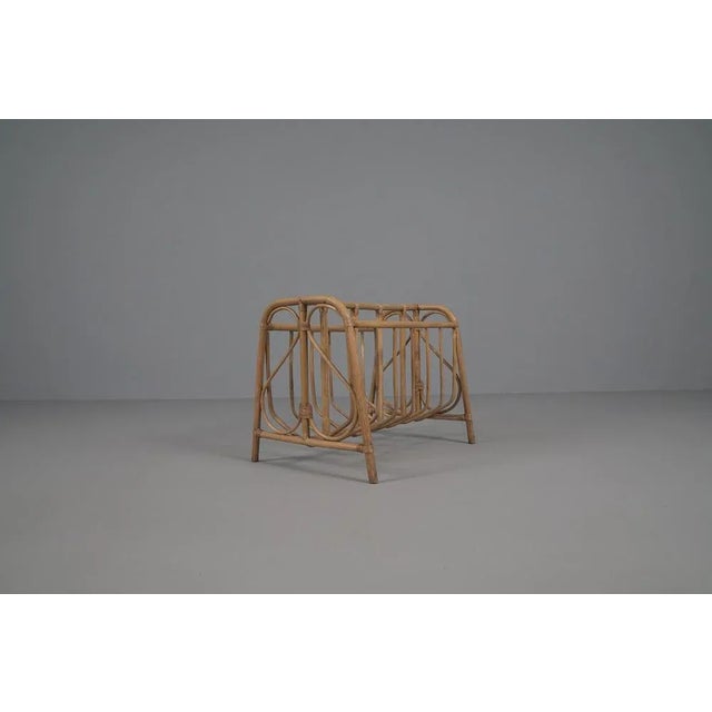 Mid-Century Modern Rattan Magazine Rack, Italy, 1960s, in Very Good conditions. Designed 1960 to 1969