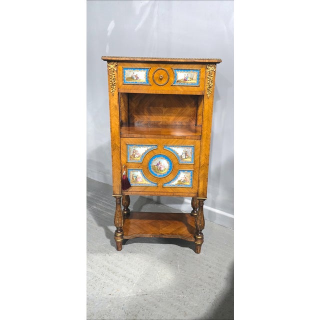 Fine inlaid Satinwood cabinet with shelf, drawer and single door, together with seven sevres plaques, ormolu mounts,...