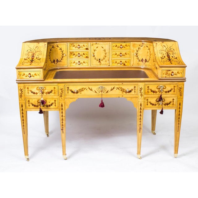 Here we have a very attractive Carlton House Desk which has been hand crafted from the very finest satinwood and decorated...