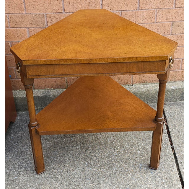 A Fine Arts Furniture Two-Tier Walnut Triangular Side Table measuring 25.25" in width, 22" in depth and stands 24.25" tall