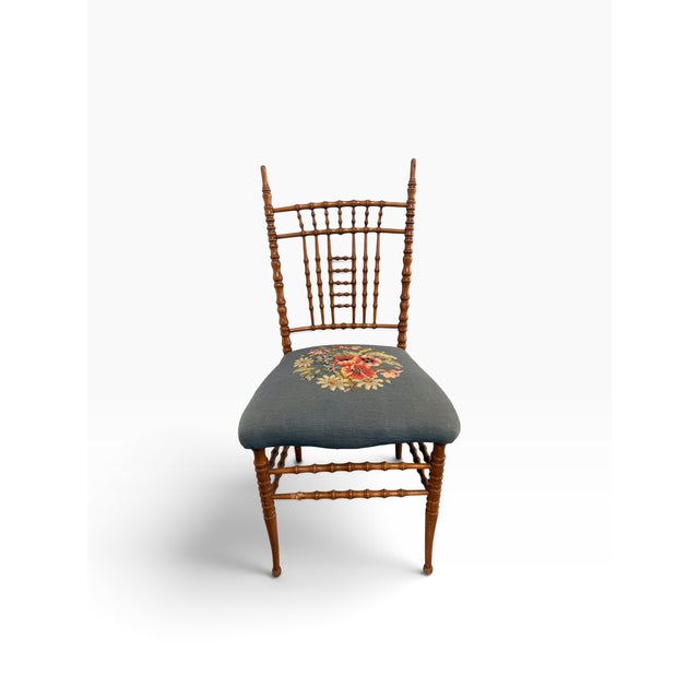 Add a touch of 19th-century European elegance to your space with this exquisite Antique Napoleon III style side chair....
