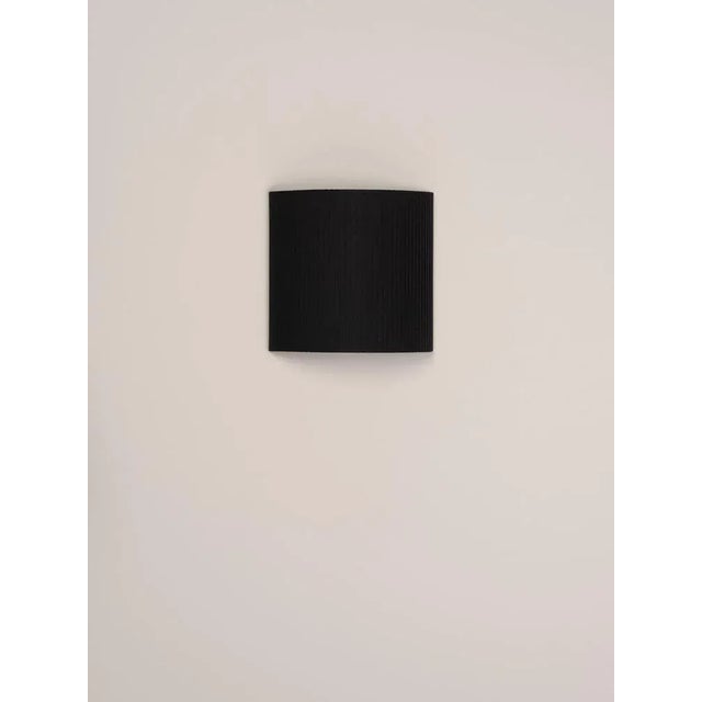Black comodín cuadrado wall lamp by santa & cole dimensions: d 31 x w 13 x h 30 cm materials: metal, ribbon. This...