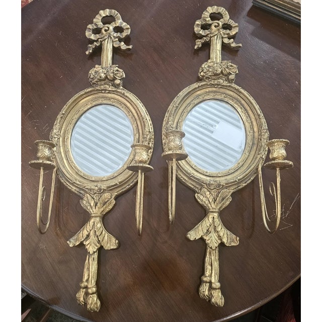 Store Item: Pair Gold Gilt Neoclasical Mirror Scones with Candlestick Holders Gilded Age Description: Pair of Gold Gilt...