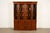 A gorgeous Georgian or Chippendale style breakfront bookcase cabinet or dining cabinet By Baker Furniture, "Historic...