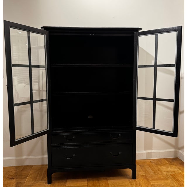Handsome and substantial Bronson Bookcase with Doors, finished in the deep Heritage Black colorway. This discontinued...