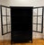 Handsome and substantial Bronson Bookcase with Doors, finished in the deep Heritage Black colorway. This discontinued...