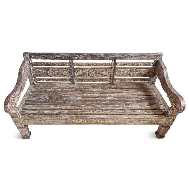 Vintage washed finish solid teak wood bench. Hand carved with intricate design patterns along back. Perfect for outdoor or...