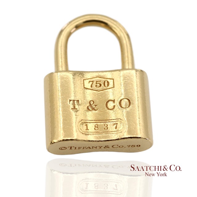 Tiffany & Co. 18K Yellow Gold Padlock Charm Pendant Necklace Metal Type: 18k Solid Yellow Gold Total Item Weight: 11.1...