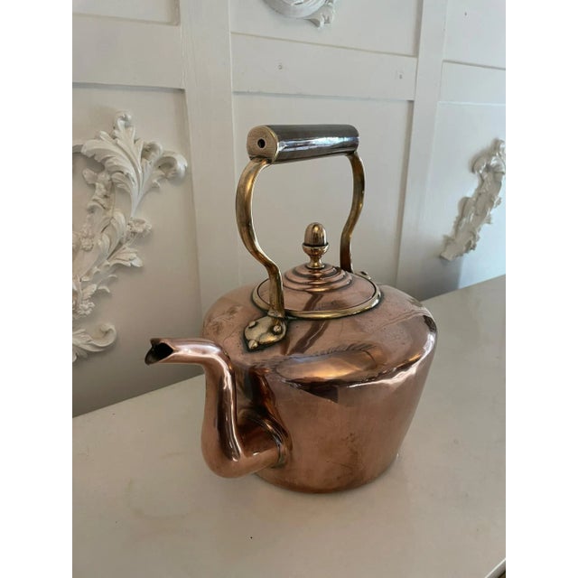 Antique george iii quality copper kettle having a quality antique george iii copper kettle with a shaped handle and spout...