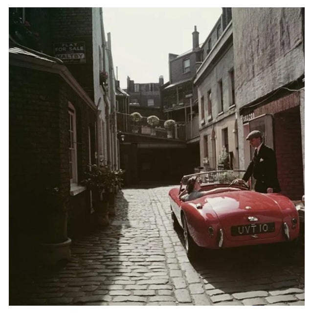Slim Aarons, Sports Car Couple, Estate Stamped Photographic Print, 1955 / 2020s For Sale