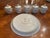 A beautiful set by Louis Lourioux- a highly collectible French porcelain house. The logo with the little running faun/pan...