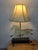 A wonderful mid-to-late 20th-century primitive folk art table lamp styled after a historic running horse weathervane. The...
