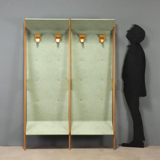 1960s coat rack made of beech wood, featuring an elegant design that echoes the period's aesthetics. The structure is...