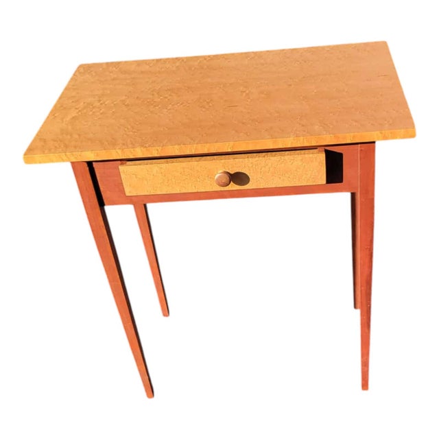 1970s Shaker-style hallway/sofa table in solid birdseye maple. Narrow rectangular top with single drawer and turned legs....