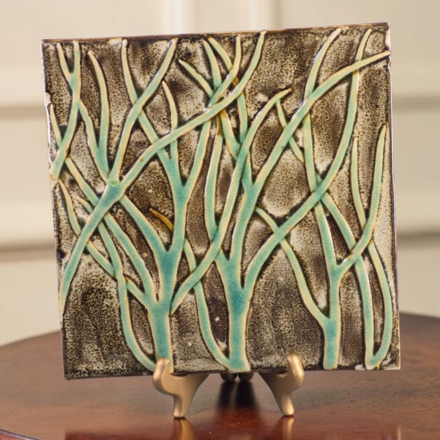 This vintage Fortunata wall hanging is a unique piece of Italian majolica ceramic trivet tile, handmade with a glazed...