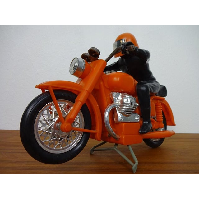 Large motorcycle with driver from the 1970s. Manufacture and probably Japan.