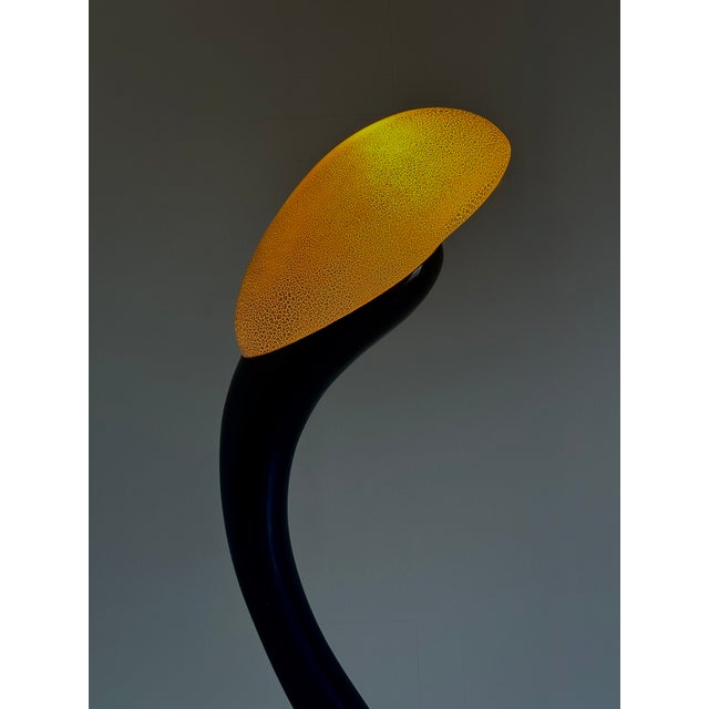 This organically shaped floor lamp is a beautiful example of Italian Space Age design . Its sculptural design evokes an...