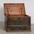 19th century Hungarian flat top trunk crafted in pine with original hand painted decoration. The surface features a blue...