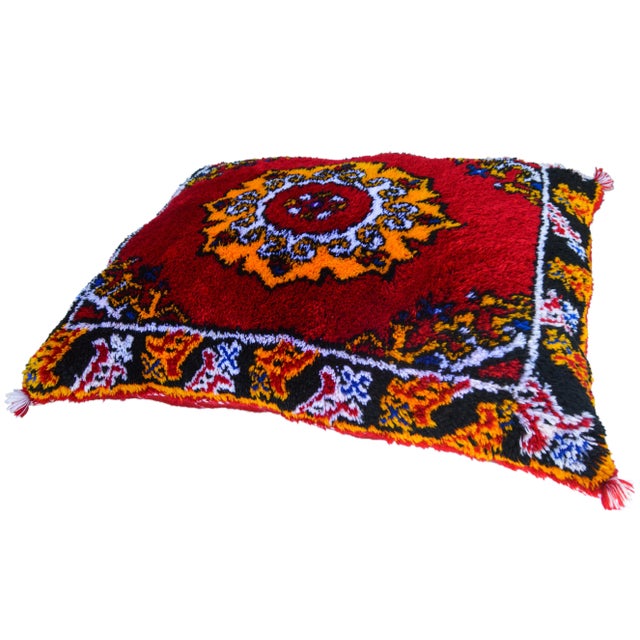 Antique handwoven pillow by the Berbers of the High Atlas Mountains of Moroccan. Features a finely-woven Berber tribal...