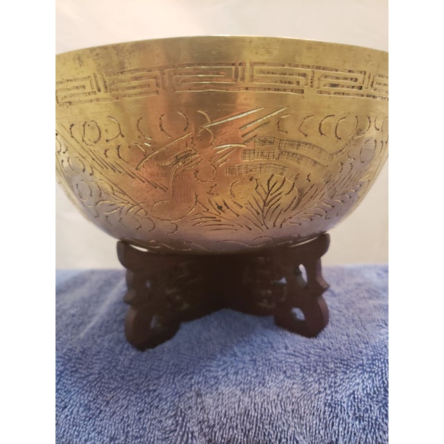 Chinese Vintage Solid Brass Bowl Dragon Motif Bowl w/Stand. The outside of the bowl is in lovely condition with some...