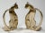 Pair of vintage solid brass bookends depicting seated cats with long elegant tails. Wonderful patina.