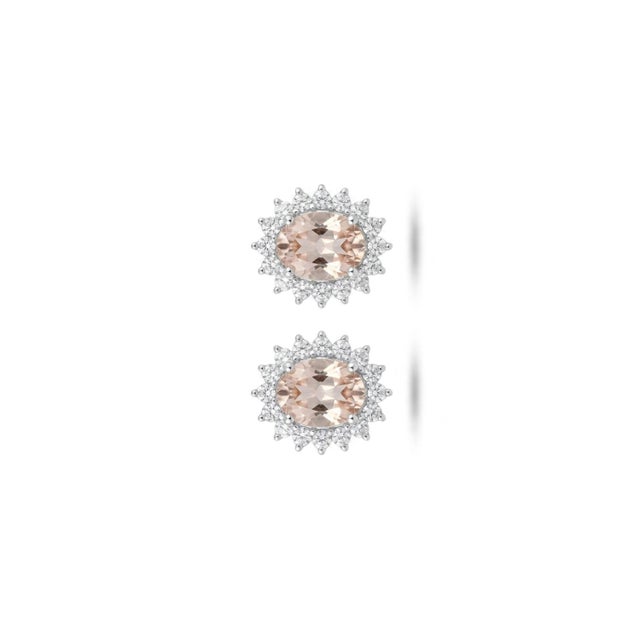 Gemstone details Diamond weight: 0.59 cts Semi stone weight: 1.77 cts 18K gold Net weight: 2.87 grams Gross weight: 3.34...