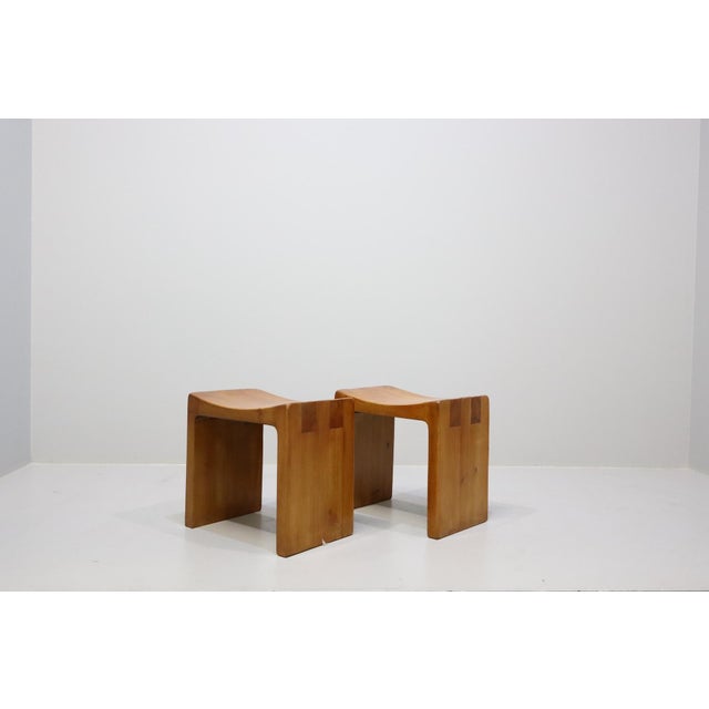 Rare pair of Italian stools by Giuseppe Rivadossi from the 1970s. The stools are made entirely of wood. Their construction...