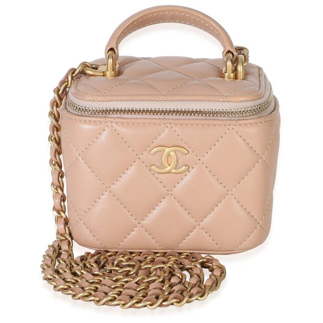 Item #: 154930 Interior Material: Fabric Size: Mini Handbag Closure Type: Zip-Around Dimensions: 4 x 3.25 x 2.25 in Circa:...