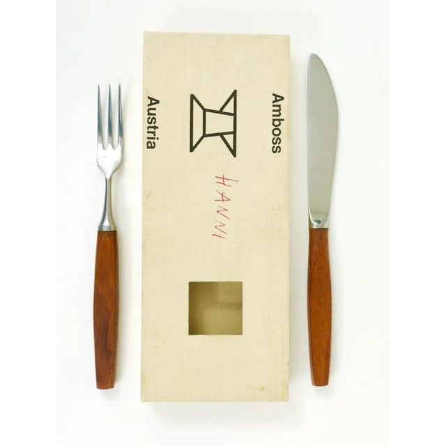 A set of six small modernist forks and knives in their original boxes. Executed in the 1950s by Amboss Austria. Made of...