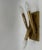 A pair of large and small brass wall sconces with a refined modernist design, comprising a three-light and a four-light...