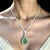 Natural Quality Emerald and Diamond Pendant Necklace with an 18" chain and set in 14k White Gold with a ct weight of 5.6...