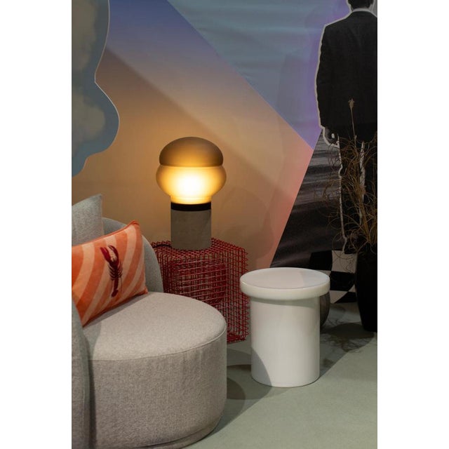 Glass is commonly associated as a lightweight with sharp edges and smooth surfaces. Sebastian Herkner's alwa other hand,...