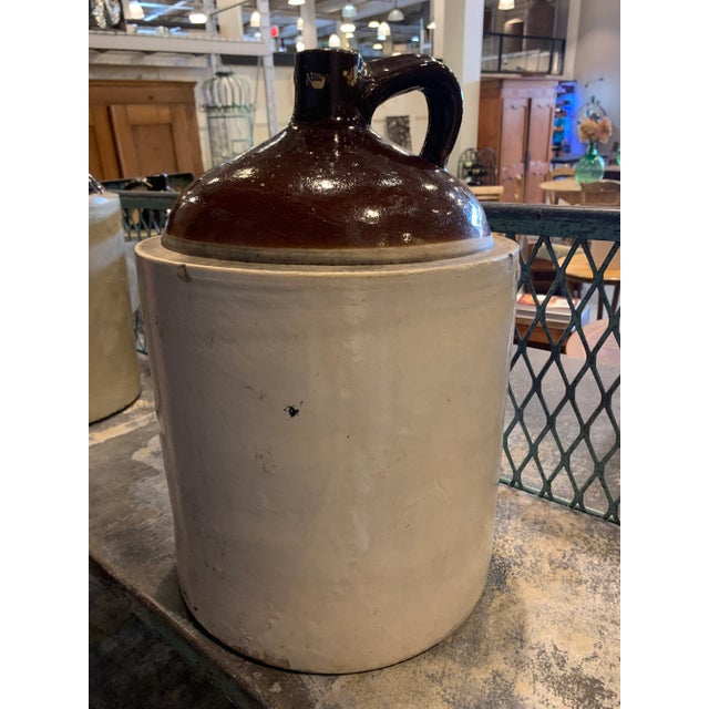 Antique stoneware jug used to make moonshine or whiskey in the early 1900s. The jug was made by the Sewer Pipe & Stoneware...